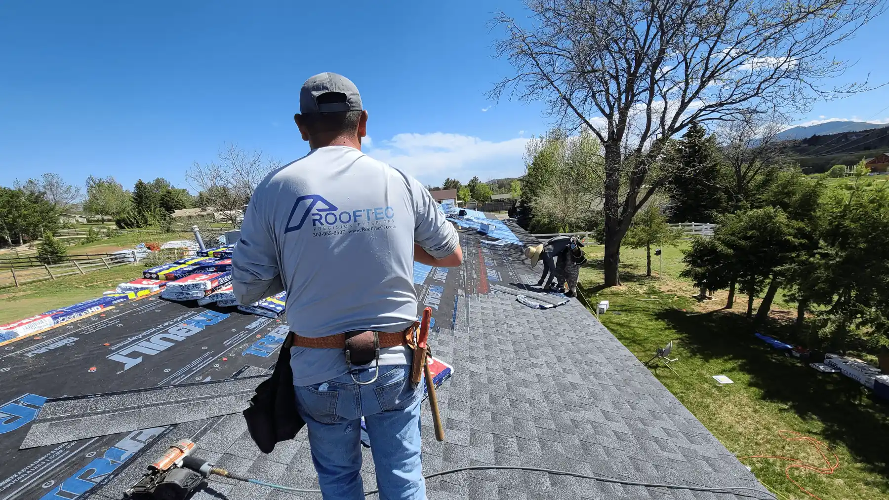 RoofTec Roofers Installing Roof Of Colorado Home Image of RoofTec roofers installing roof on Colorado home